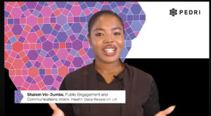 A person wearing a dark top speaks to camera in a video or presentation setting. Behind the speaker is a purple and pink geometric pattern, with the PEDRI logo displayed in the top-right corner. A text caption on screen reads: ‘Shalom Vic-Jumbo, Public Engagement and Communications Intern, Health Data Research UK.’ The speaker is shown from the waist up against a graphic background.